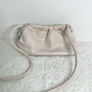 Clutch bag with shoulder strap
